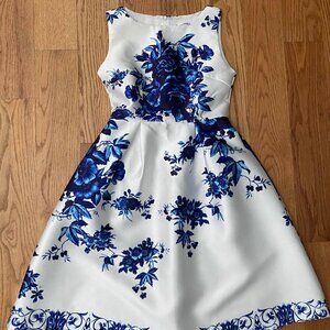 White Spring Sleeveless Dress with Dark Blue Floral Pattern by Flower Stone